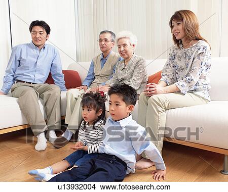 Family watching TV View Large Photo Image Picture - Family watching TV. Fotosearch