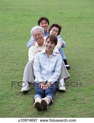 Stock Photo - Portrait of a family. Fotosearch