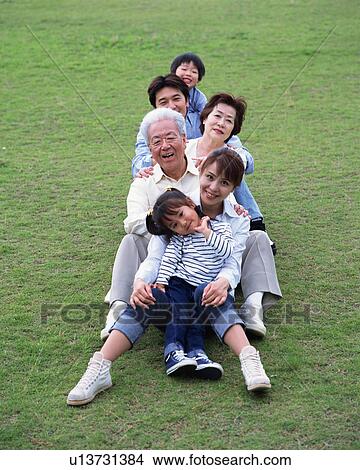 Picture - Portrait of three generational family. Fotosearch