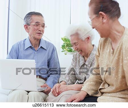 Senior people talking in a living room View Large Photo Image Stock Image - Senior people talking in a living room. Fotosearch