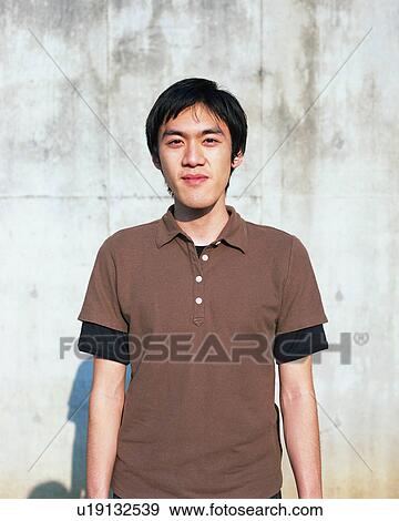 Portrait of a young man View Large Photo Image Stock Photo - Portrait of a young man. Fotosearch