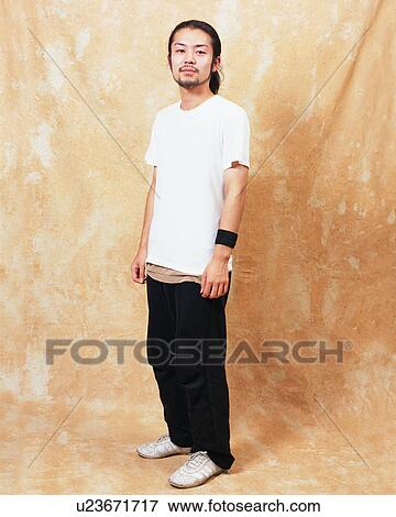 Portrait of a young man View Large Photo Image Stock Photo - Portrait of a young man. Fotosearch