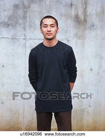 Portrait of a young man View Large Photo Image Stock Photograph - Portrait of a young man. Fotosearch