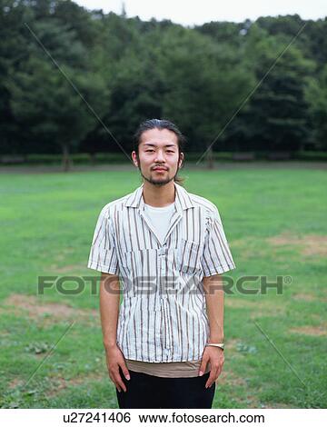 Portrait of a young man View Large Photo Image Stock Photograph - Portrait of a young man. Fotosearch