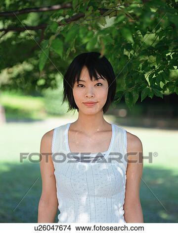 Portrait of a young woman View Large Photo Image Picture - Portrait of a young woman. Fotosearch