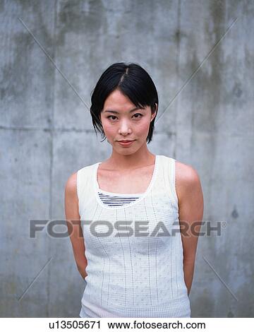 Stock Image - Portrait of a young woman. Fotosearch