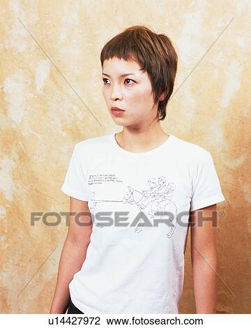 Stock Image - Portrait of a young woman. Fotosearch