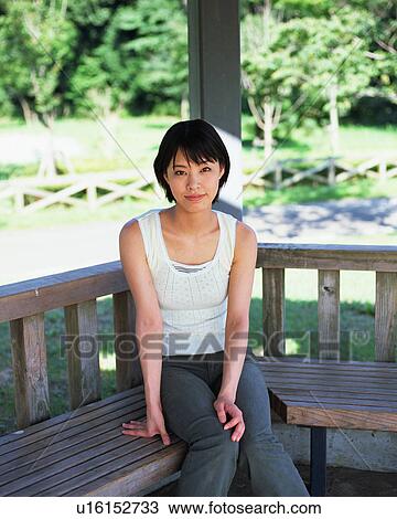 Stock Image - Portrait of a young woman. Fotosearch