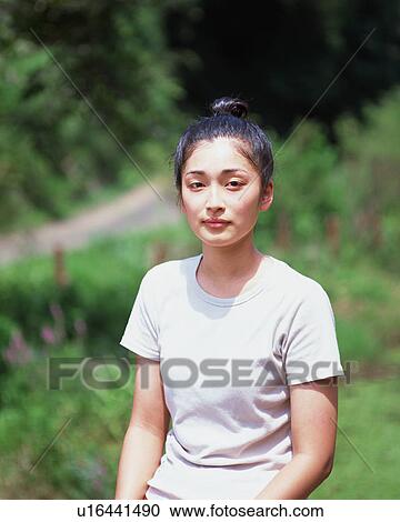 Stock Image - Portrait of a young woman. Fotosearch