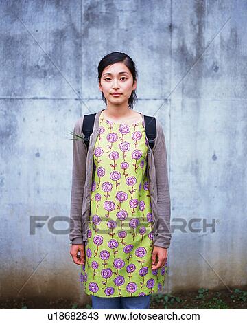 Stock Image - Portrait of a young woman. Fotosearch
