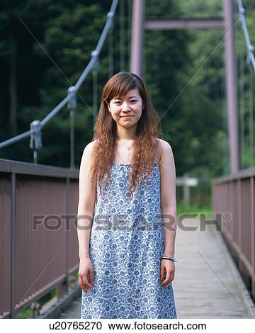 Portrait of a young woman View Large Photo Image Stock Image - Portrait of a young woman. Fotosearch