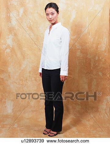 Stock Photo - Portrait of a young woman. Fotosearch