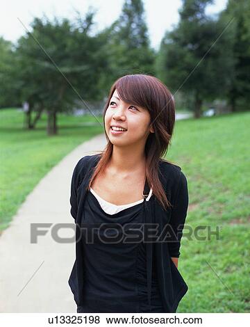Stock Photo - Portrait of a young woman. Fotosearch