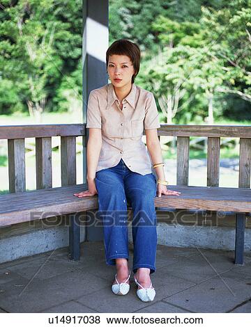 Stock Photo - Portrait of a young woman. Fotosearch