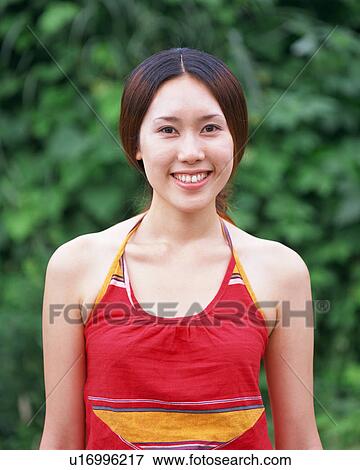 Portrait of a young woman View Large Photo Image Stock Photo - Portrait of a young woman. Fotosearch