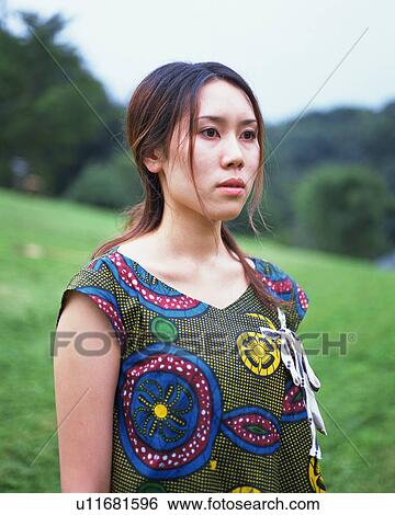 Portrait of a young woman View Large Photo Image Stock Photograph - Portrait of a young woman. Fotosearch
