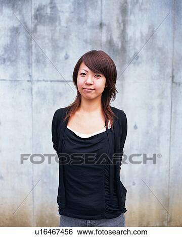 Portrait of a young woman View Large Photo Image Stock Photograph - Portrait of a young woman. Fotosearch