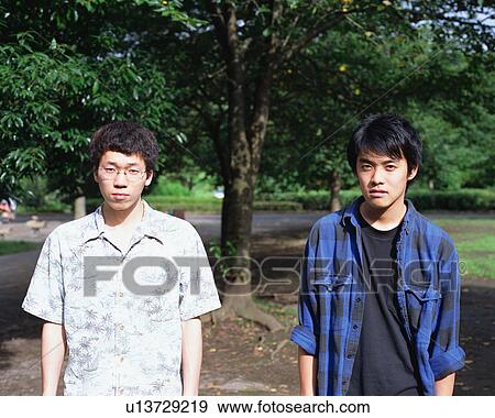 Stock Photo - Portrait of two young men. Fotosearch