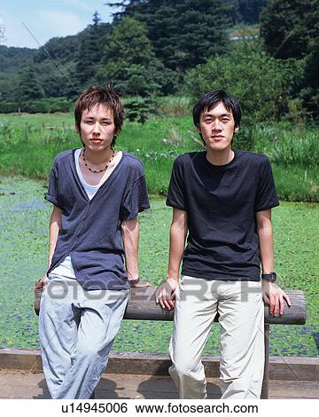 Portrait of two young men View Large Photo Image Stock Photograph - Portrait of two young men. Fotosearch