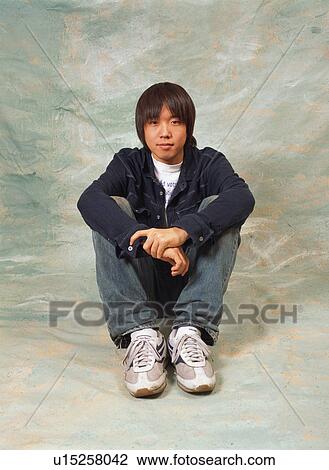 Stock Image - Portrait of a young man. Fotosearch