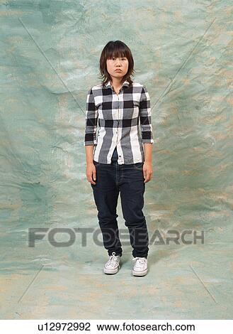 Stock Image - Portrait of a young woman. Fotosearch