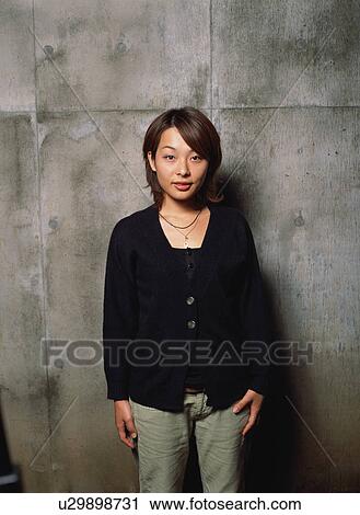 Stock Image - Portrait of a young woman. Fotosearch