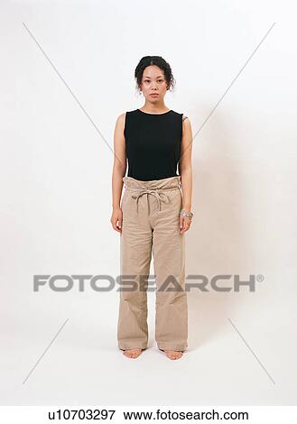 Portrait of a young woman View Large Photo Image Stock Photo - Portrait of a young woman. Fotosearch