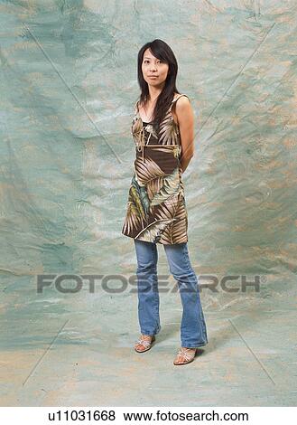 Portrait of a young woman View Large Photo Image Stock Photo - Portrait of a young woman. Fotosearch