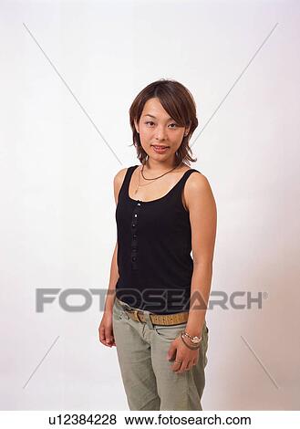 Portrait of a young woman View Large Photo Image Stock Photo - Portrait of a young woman. Fotosearch