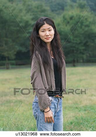 Stock Photo - Portrait of a young woman. Fotosearch