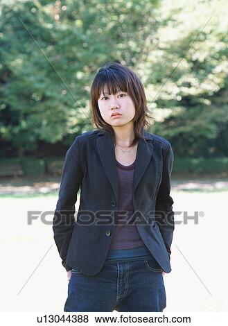 Portrait of a young woman View Large Photo Image Stock Photo - Portrait of a young woman. Fotosearch