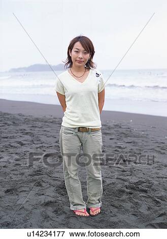 Portrait of a young woman View Large Photo Image Stock Photo - Portrait of a young woman. Fotosearch