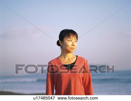 Stock Photo - Portrait of a young woman. Fotosearch