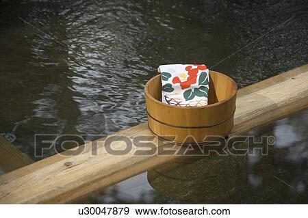 Bathing pail at hot springs in Japan View Large Photo Image Stock Photo - Bathing pail at hot springs in Japan. Fotosearch