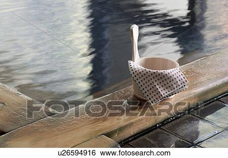 Stock Photograph - Bathing pail at hot springs in Japan. Fotosearch