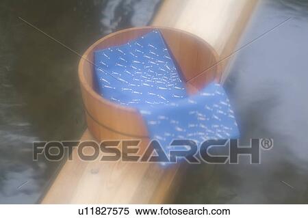 Bathing pail at hot springs in Japan View Large Photo Image Stock Photography - Bathing pail at hot springs in Japan. Fotosearch