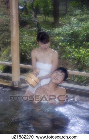 Two young women bathing in hot springs View Large Photo Image Stock Image - Two young women bathing in hot springs. Fotosearch