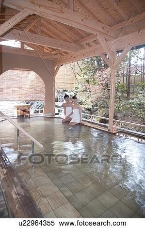 Two young women bathing in hot springs View Large Photo Image Stock Photography - Two young women bathing in hot springs. Fotosearch