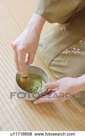 A woman in kimono making green tea View Large Photo Image Stock Photo - A woman in kimono making green tea. Fotosearch