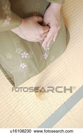 A woman in kimono sitting on tatami mat View Large Photo Image Stock Image - A woman in kimono sitting on tatami mat. Fotosearch