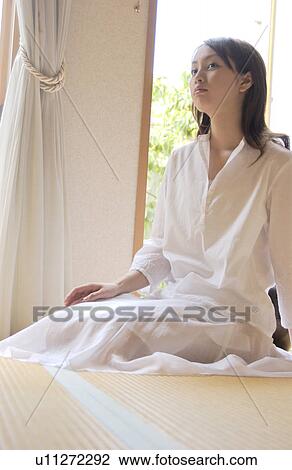 Portrait of a woman sitting View Large Photo Image Stock Image - Portrait of a woman sitting. Fotosearch