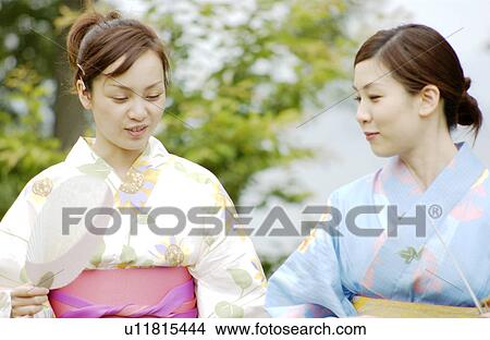 Portrait of Two young women in kimono View Large Photo Image Picture - Portrait of Two young women in kimono. Fotosearch