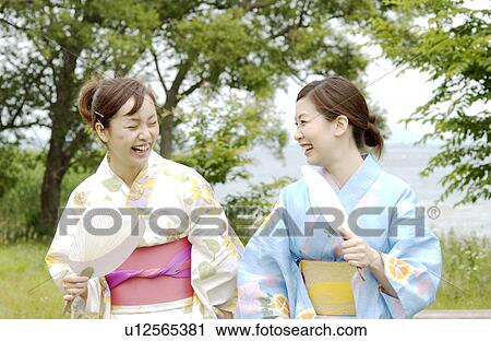 Portrait of Two young women in kimono View Large Photo Image Stock Image - Portrait of Two young women in kimono. Fotosearch