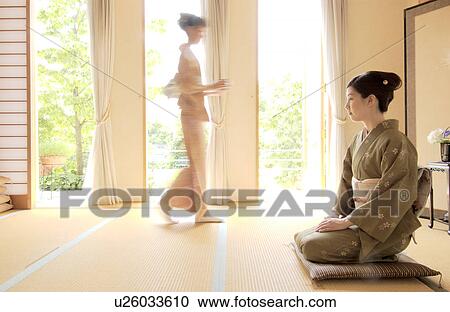 Two women in kimono attending tea ceremony, blurred motion View Large Photo Image Stock Image - Two women in kimono attending tea ceremony, blurred motion. Fotosearch