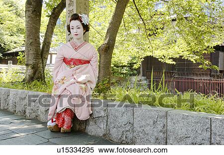 A Geisha woman sitting View Large Photo Image Stock Photography - A Geisha woman sitting. Fotosearch