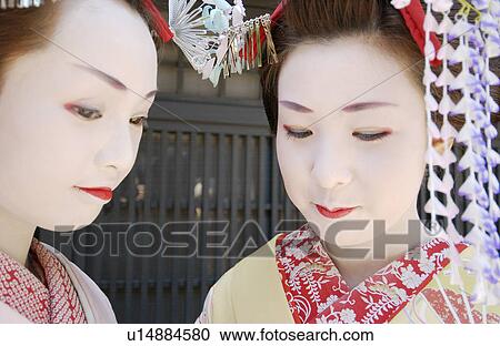 Portrait of two Geisha women View Large Photo Image Stock Image - Portrait of two Geisha women. Fotosearch