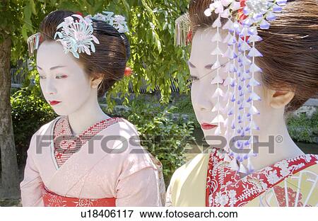 Stock Photo - Portrait of two Geisha women. Fotosearch
