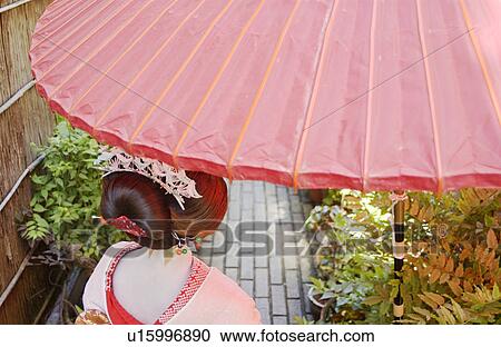 Rear view of a geisha woman, close-up View Large Photo Image Stock Image - Rear view of a geisha woman, close-up. Fotosearch