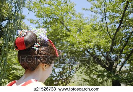 Rear view of a geisha woman, close-up View Large Photo Image Stock Photo - Rear view of a geisha woman, close-up. Fotosearch