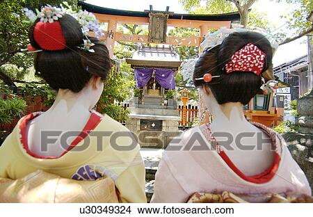 Rear view of two Geisha women View Large Photo Image Picture - Rear view of two Geisha women. Fotosearch